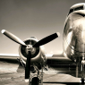 vintage airplane on a runway / Fahrzeuge