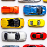 Overhead view on colorful car toys / Fahrzeuge
