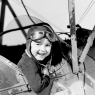 Little boy in cockpit of plane / Vintage