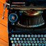 old vintage typewriter on wood table bird view / Vintage
